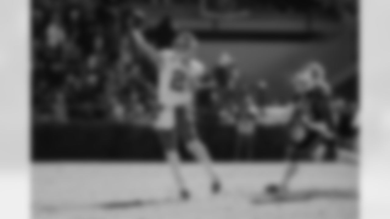 Clemson quarterback Cade Klubnik (2) throws on the run from South Carolina defensive end Bryan Thomas Jr. (46) during the first half of an NCAA college football game, Saturday, Nov. 29, 2025, in Columbia, S.C. (AP Photo/Scott Kinser)