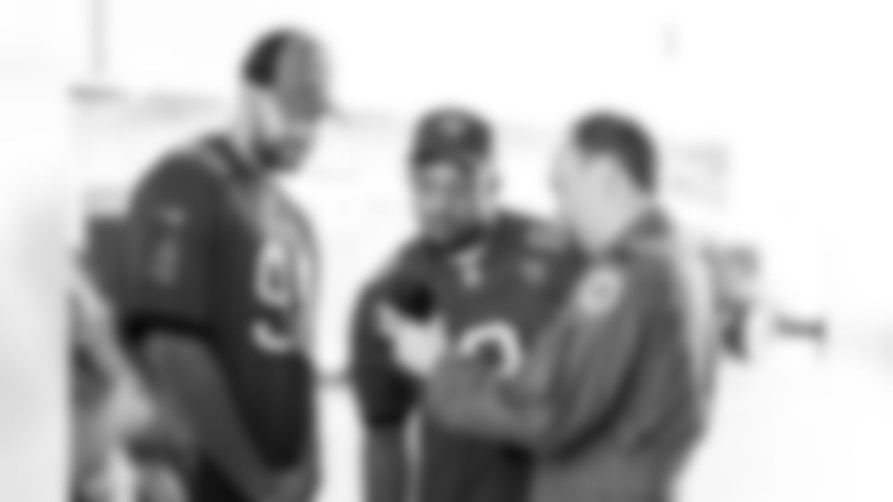 TAMPA, FL - December 02, 2025 - Outside Linebacker Anthony Nelson #98 and Inside Linebacker SirVocea Dennis #8 of the Tampa Bay Buccaneers during a visit to MacDill Air Force Base. Photo By Kyle Zedaker/Tampa Bay Buccaneers