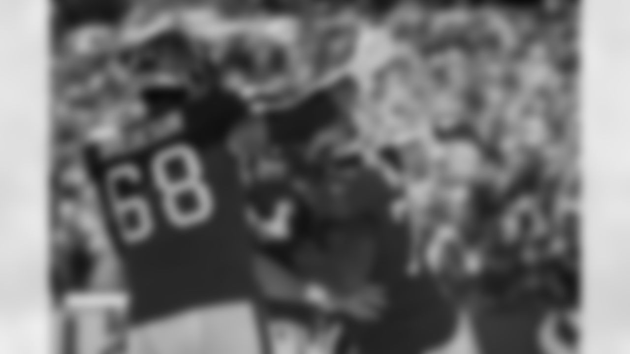 TAMPA, FL - November 30, 2025 - Guard Ben Bredeson #68, Center Graham Barton #62, and Tackle Tristan Wirfs #78 of the Tampa Bay Buccaneers celebrate a touchdown during the game between the Arizona Cardinals and Tampa Bay Buccaneers. The Bucs won the game, 20-17. Photo By Kyle Zedaker/Tampa Bay Buccaneers