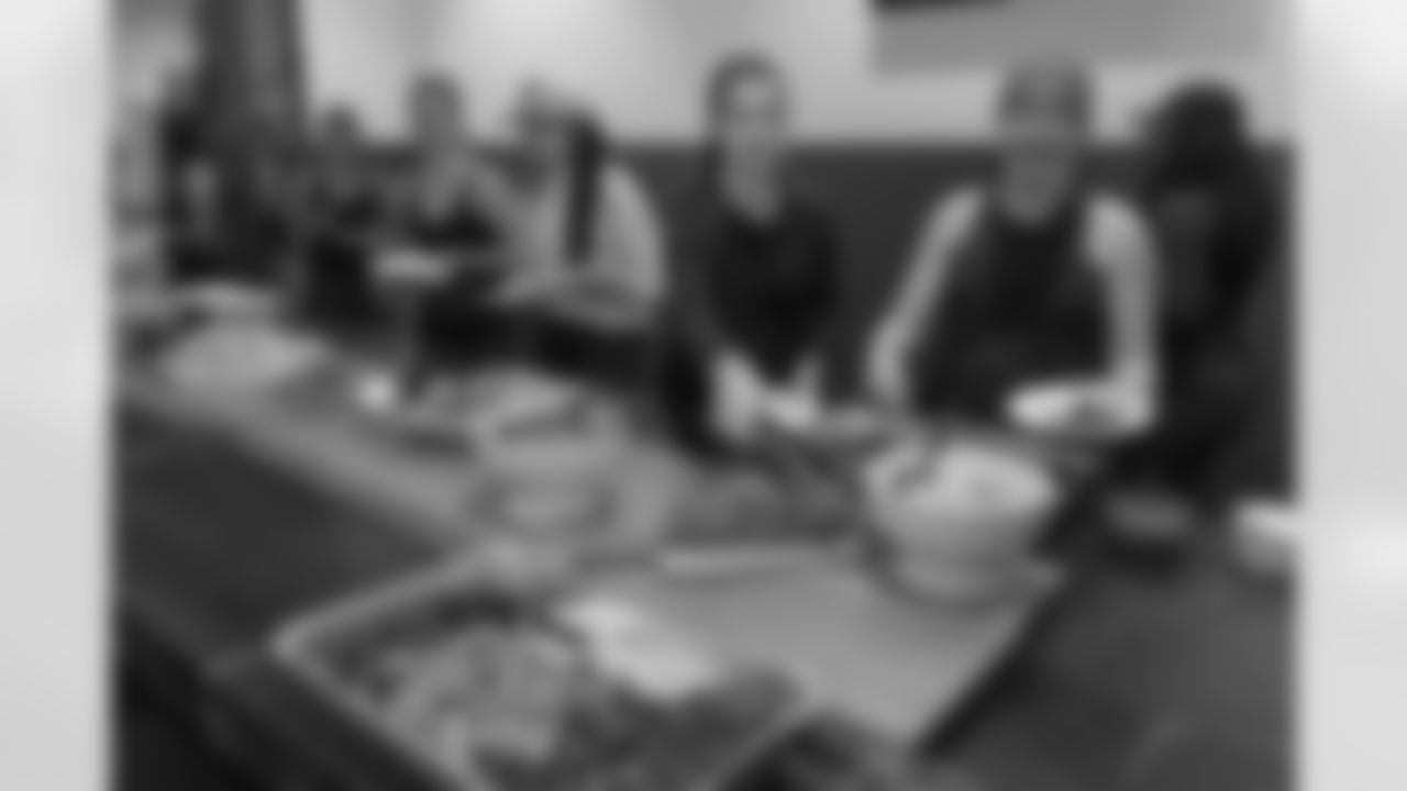 TAMPA, FL - December 06, 2025 - She is Football Bayshore Walk: Raise The Flags event with Bayshore Breakfast Club and Tampa Girls Social & Wellness at Hyde House Public Studio. Photo By Mike Carlson/Tampa Bay Buccaneers