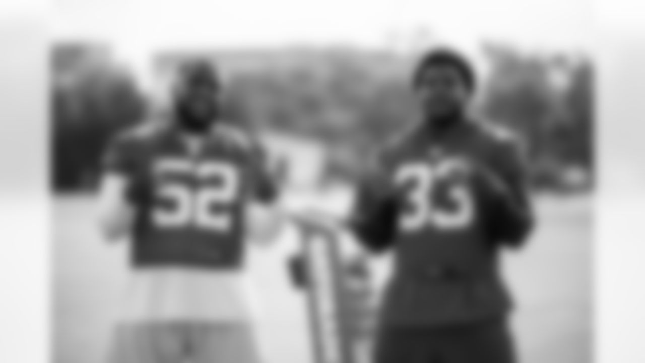 TAMPA, FL - May 20, 2025 - Defensive Lineman C.J. Brewer #52 and Outside Linebacker Jose Ramirez #33 of the Tampa Bay Buccaneers during Phase 2 workouts at AdventHealth Training Center. Photo By Kyle Zedaker/Tampa Bay Buccaneers
