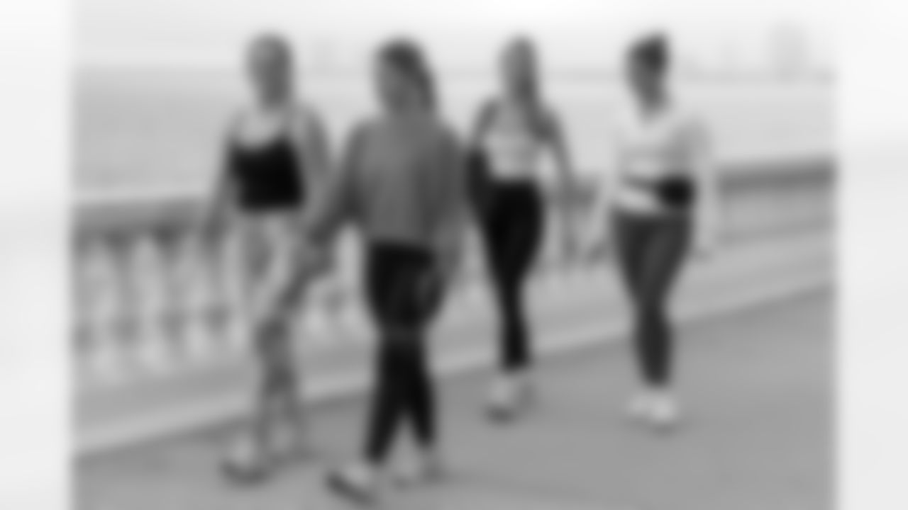 TAMPA, FL - December 06, 2025 - She is Football Bayshore Walk: Raise The Flags event with Bayshore Breakfast Club and Tampa Girls Social & Wellness at Hyde House Public Studio. Photo By Mike Carlson/Tampa Bay Buccaneers