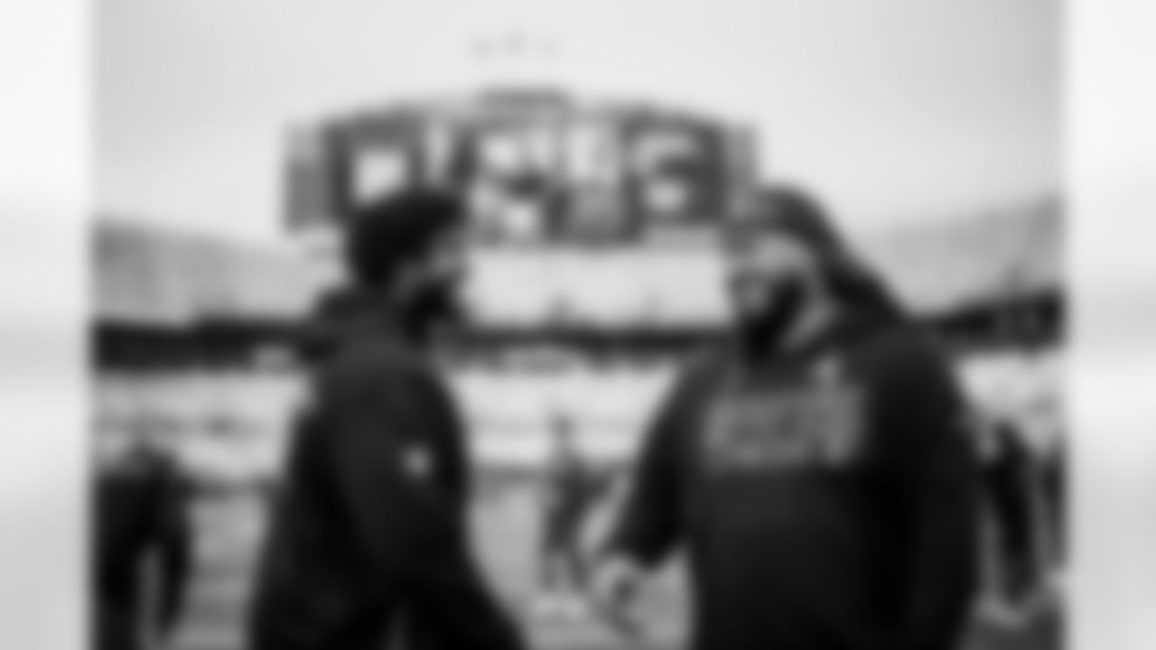 CHARLOTTE, NC - December 21, 2025 - Tackle Tristan Wirfs #78 and Defensive Tackle Vita Vea #50 of the Tampa Bay Buccaneers before the game between the Tampa Bay Buccaneers and Carolina Panthers. The Bucs lost the game, 23-20. Photo By Tori Richman/Tampa Bay Buccaneers