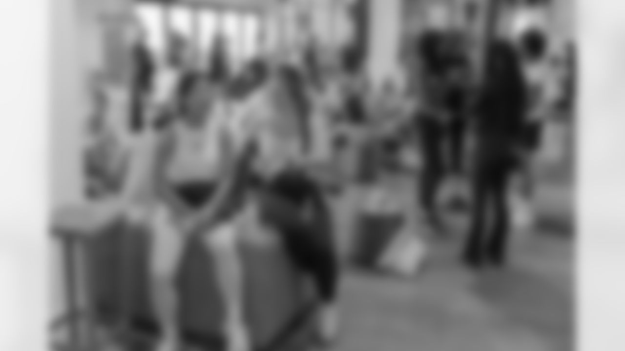 TAMPA, FL - December 06, 2025 - She is Football Bayshore Walk: Raise The Flags event with Bayshore Breakfast Club and Tampa Girls Social & Wellness at Hyde House Public Studio. Photo By Mike Carlson/Tampa Bay Buccaneers