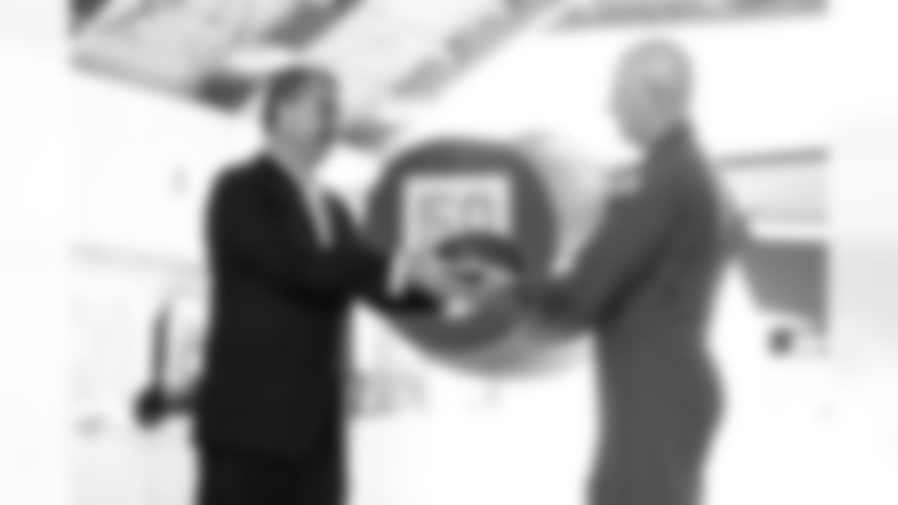 TAMPA, FL - December 02, 2025 - Brian Ford and Colonel Edward V. Szczepanik during a visit to MacDill Air Force Base. Photo By Kyle Zedaker/Tampa Bay Buccaneers