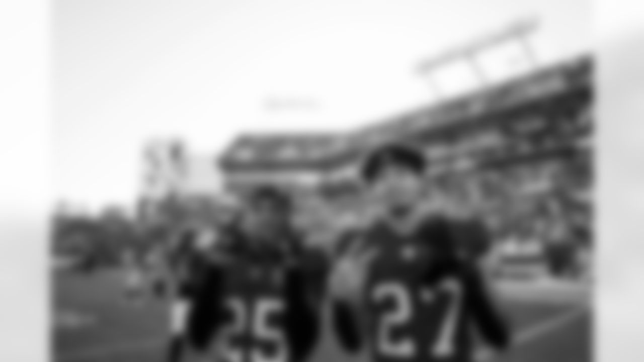 TAMPA, FL - November 30, 2025 - Cornerback Jacob Parrish #25 and Cornerback Zyon McCollum #27 of the Tampa Bay Buccaneers after the game between the Arizona Cardinals and Tampa Bay Buccaneers. The Bucs won the game, 20-17. Photo By Tori Richman/Tampa Bay Buccaneers