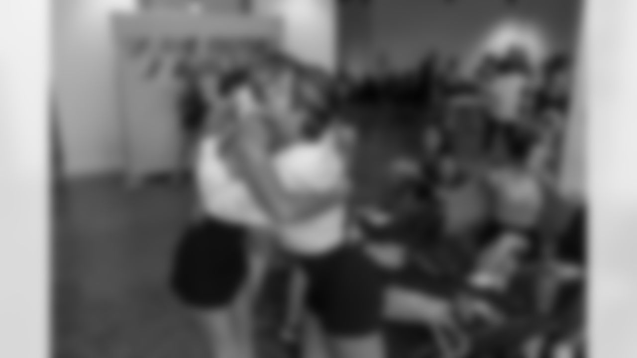 TAMPA, FL - December 06, 2025 - She is Football Bayshore Walk: Raise The Flags event with Bayshore Breakfast Club and Tampa Girls Social & Wellness at Hyde House Public Studio. Photo By Mike Carlson/Tampa Bay Buccaneers