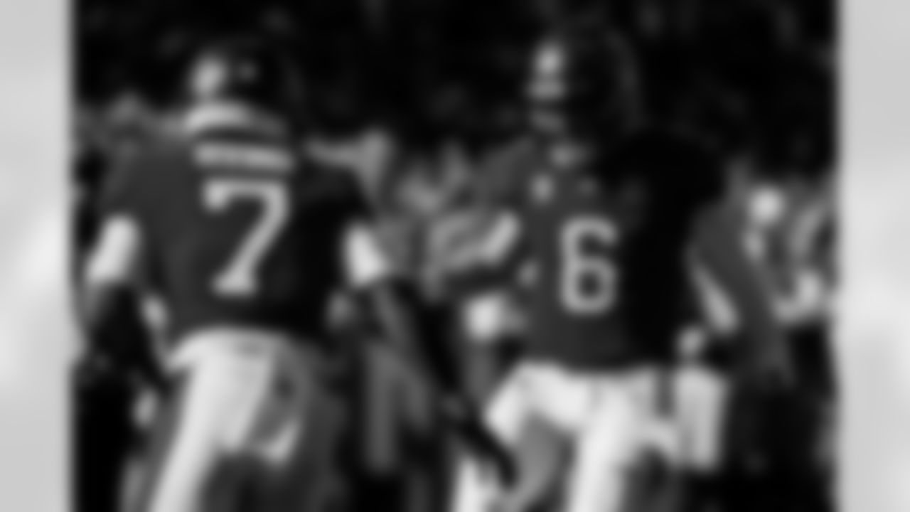 TAMPA, FL - November 30, 2025 - Running Back Bucky Irving #7 and Quarterback Baker Mayfield #6 of the Tampa Bay Buccaneers celebrate a touchdown during the game between the Arizona Cardinals and Tampa Bay Buccaneers. The Bucs won the game, 20-17. Photo By Kyle Zedaker/Tampa Bay Buccaneers