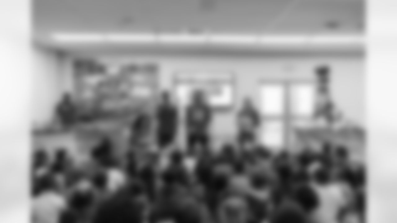 TAMPA, FL - March 03, 2026 - Safety Rashad Wisdom #38 of the Tampa Bay Buccaneers and Tampa Bay Buccaneers Cheerleaders during the National Reading Month celebration hosted by The Tampa Bay Buccaneers and Dr. Seuss Enterprises at Potter Elementary School. Photo By Doug DeFelice/Tampa Bay Buccaneers