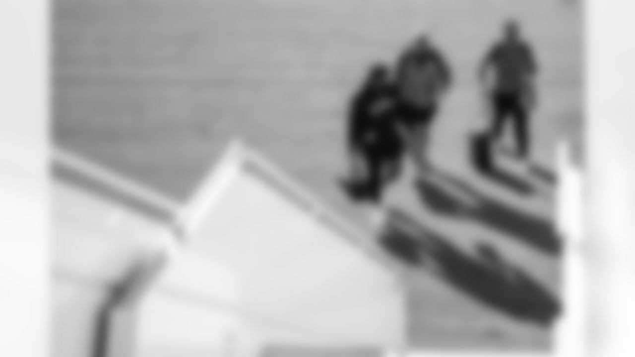 TAMPA, FL - November 22, 2025 - Tackle Tristan Wirfs #78, Center Graham Barton #62, and Guard Ben Bredeson #68 of the Tampa Bay Buccaneers depart before the game against the Los Angeles Rams. Photo By Tori Richman/Tampa Bay Buccaneers