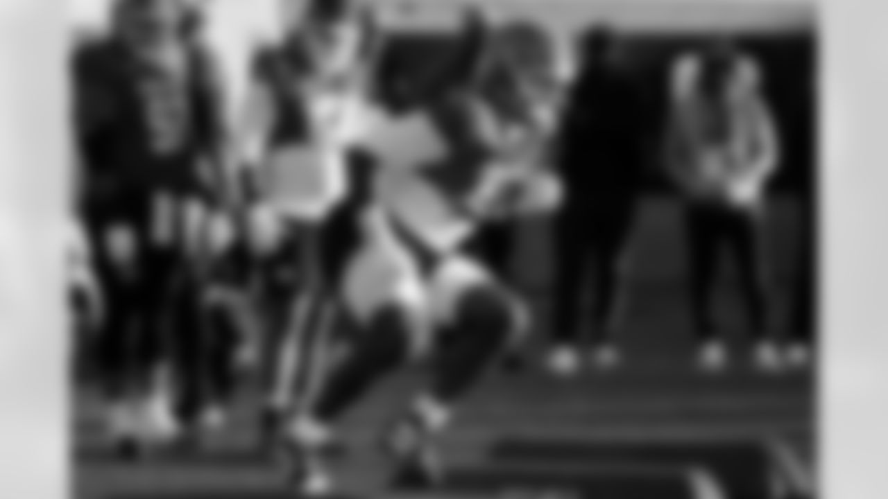 American Team defensive tackle Caleb Banks (88), of Florida, runs through drills during practice for the Senior Bowl NCAA college football game Tuesday, Jan. 27, 2026, in Mobile, Ala. (AP Photo/Butch Dill)