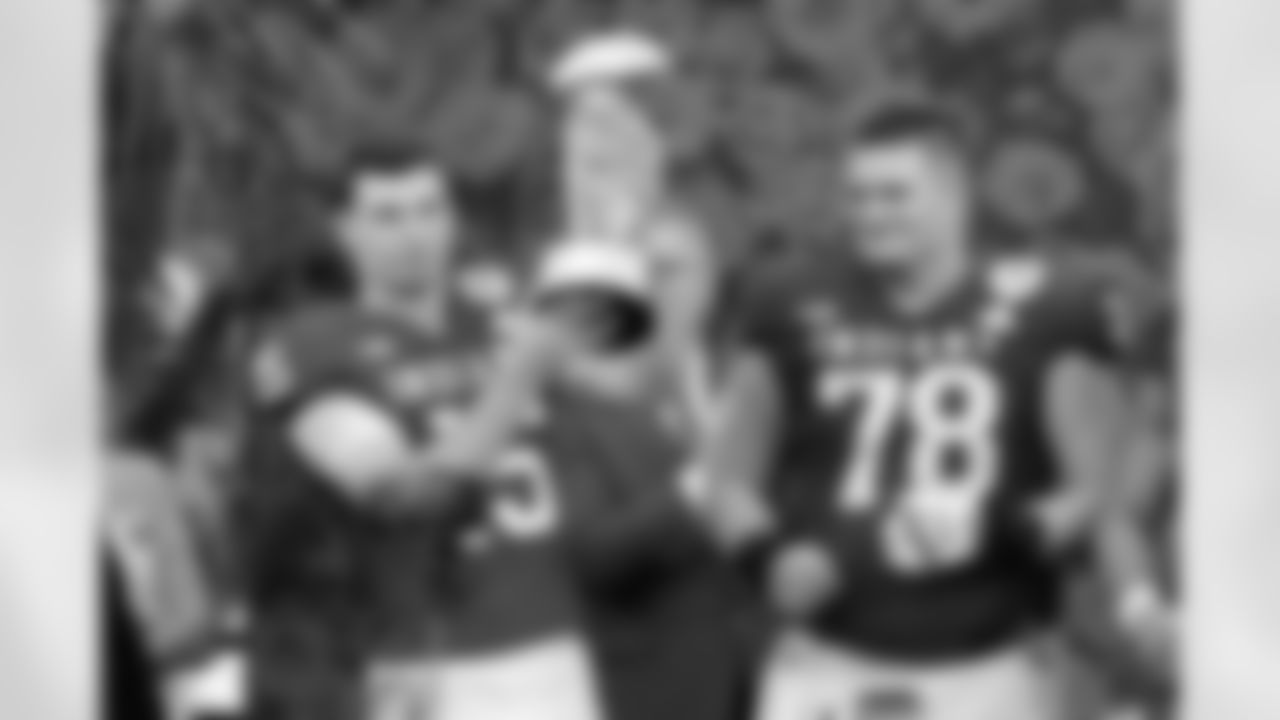 Indiana quarterback Fernando Mendoza (15) and offensive lineman Pat Coogan (78) celebrate after a win over Alabama in the Rose Bowl College Football Playoff quarterfinal game Thursday, Jan. 1, 2026, in Pasadena, Calif. (AP Photo/Mark J. Terrill)