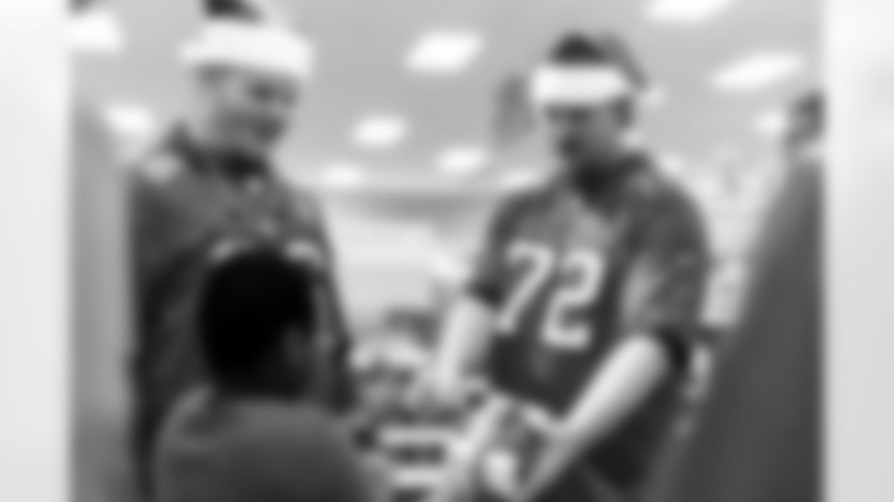 TAMPA, FL - December 15, 2025 - The Tampa Bay Buccaneers offensive line hosts the annual 'O-Line Lights Up Christmas' event providing holiday shopping sprees for local children. Photo By Kyle Zedaker/Tampa Bay Buccaneers