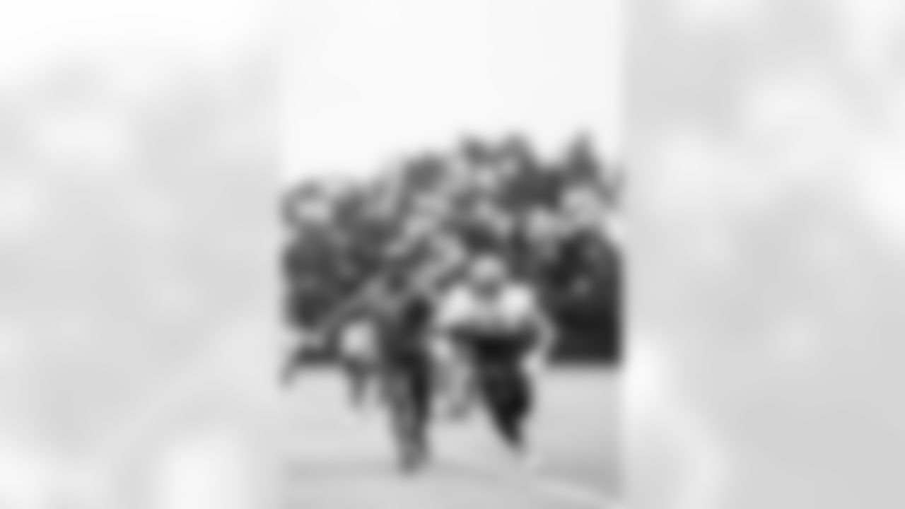 TAMPA, FL - November 06, 2025 - Defensive/Special Teams Assistant Keith Tandy and Running Back Josh Williams #18 of the Tampa Bay Buccaneers during practice at AdventHealth Training Center. Photo By Tori Richman/Tampa Bay Buccaneers