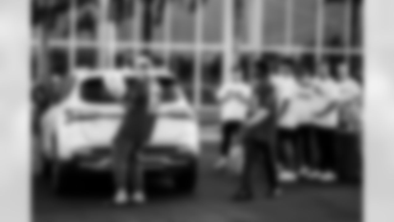 TAMPA, FL - November 25, 2025 - Wide Receiver Ryan Miller #81 and Wide Receiver Kameron Johnson #19 of the Tampa Bay Buccaneers during Turkey Time with the O-Line. Photo By Kyle Zedaker/Tampa Bay Buccaneers