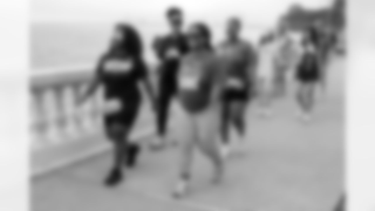 TAMPA, FL - December 06, 2025 - She is Football Bayshore Walk: Raise The Flags event with Bayshore Breakfast Club and Tampa Girls Social & Wellness at Hyde House Public Studio. Photo By Mike Carlson/Tampa Bay Buccaneers