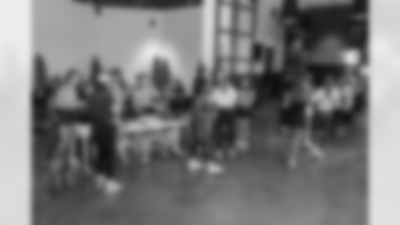 TAMPA, FL - December 06, 2025 - She is Football Bayshore Walk: Raise The Flags event with Bayshore Breakfast Club and Tampa Girls Social & Wellness at Hyde House Public Studio. Photo By Mike Carlson/Tampa Bay Buccaneers