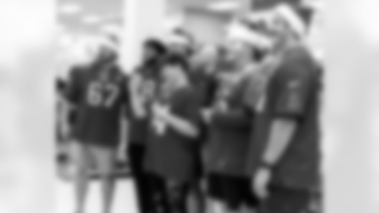 TAMPA, FL - December 15, 2025 - The Tampa Bay Buccaneers offensive line hosts the annual 'O-Line Lights Up Christmas' event providing holiday shopping sprees for local children. Photo By Kyle Zedaker/Tampa Bay Buccaneers