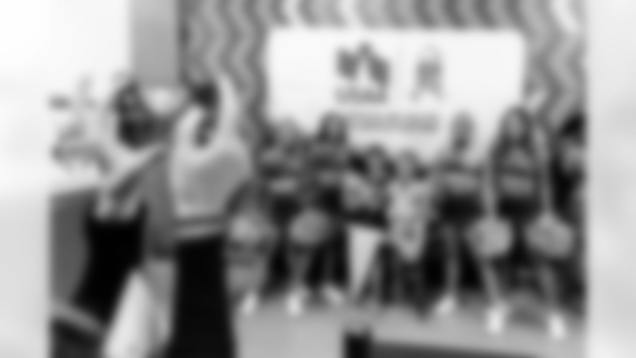 TAMPA, FL - December 02, 2025 - Tampa Bay Buccaneers Cheerleaders during a visit to MacDill Air Force Base. Photo By Kyle Zedaker/Tampa Bay Buccaneers