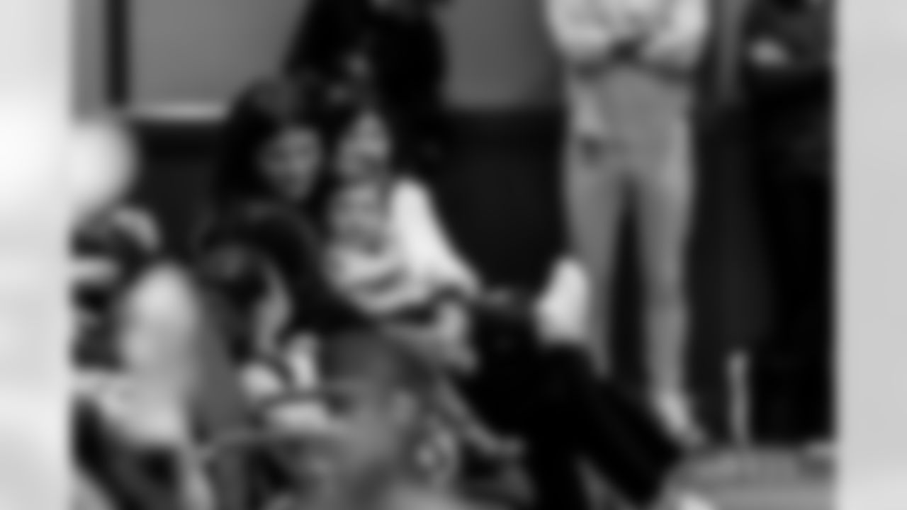 TAMPA, FL - January 27, 2026 - Offensive Coordinator Zac Robinson of the Tampa Bay Buccaneers' family during his introductory press conference at AdventHealth Training Center. Photo By Tori Richman/Tampa Bay Buccaneers