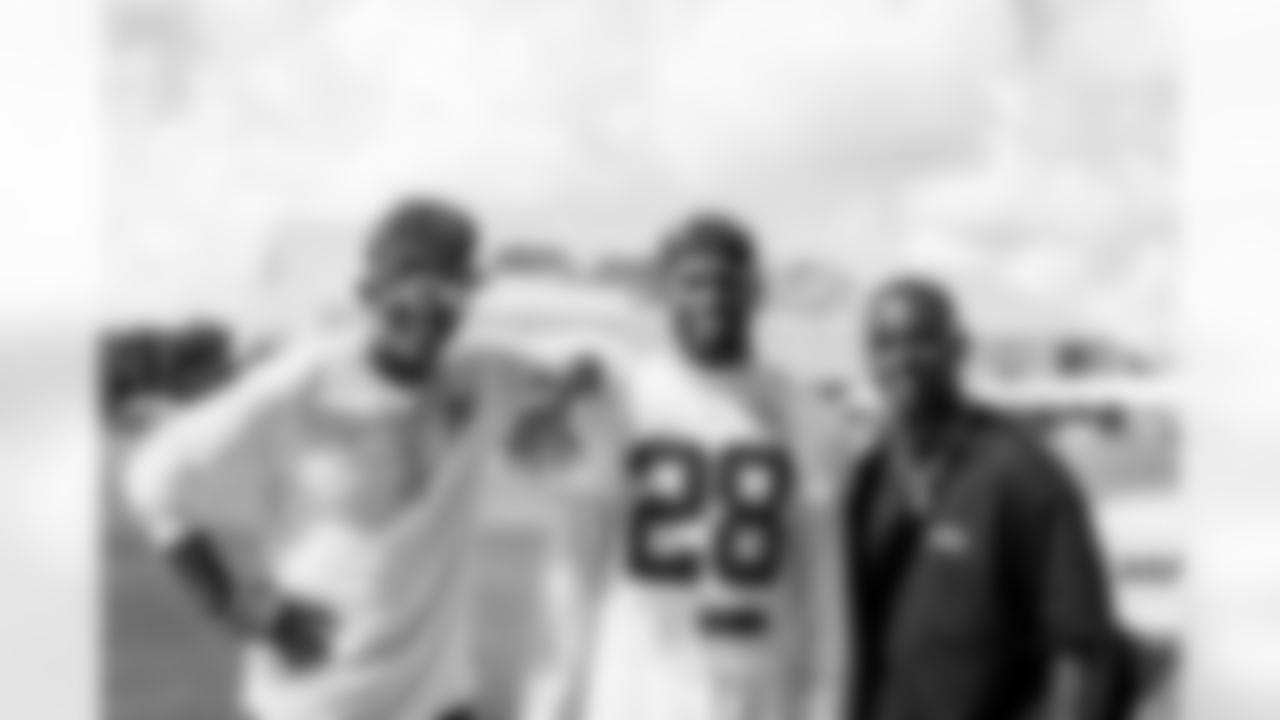 TAMPA, FL - July 23, 2025 - Safety Shilo Sanders #28 of the Tampa Bay Buccaneers with his father Deion Sanders and brother Deion Sanders Jr. during 2025 Training Camp at AdventHealth Training Center. Photo By Tori Richman/Tampa Bay Buccaneers