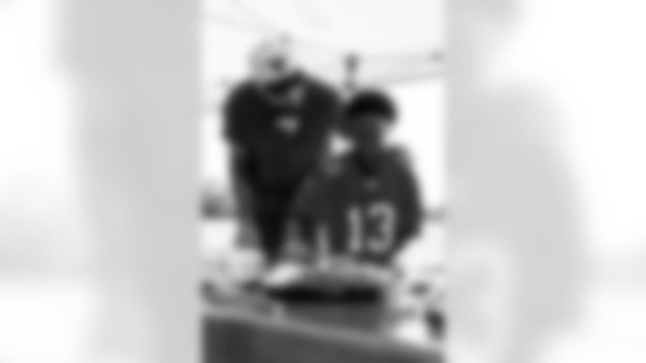 TAMPA, FL - December 05, 2025 - Mike and Ashli Evans host the Mike Evans Family Foundation 'Catch for Christmas' holiday event at AdventHealth Training Center. Photo By Kyle Zedaker/Tampa Bay Buccaneers