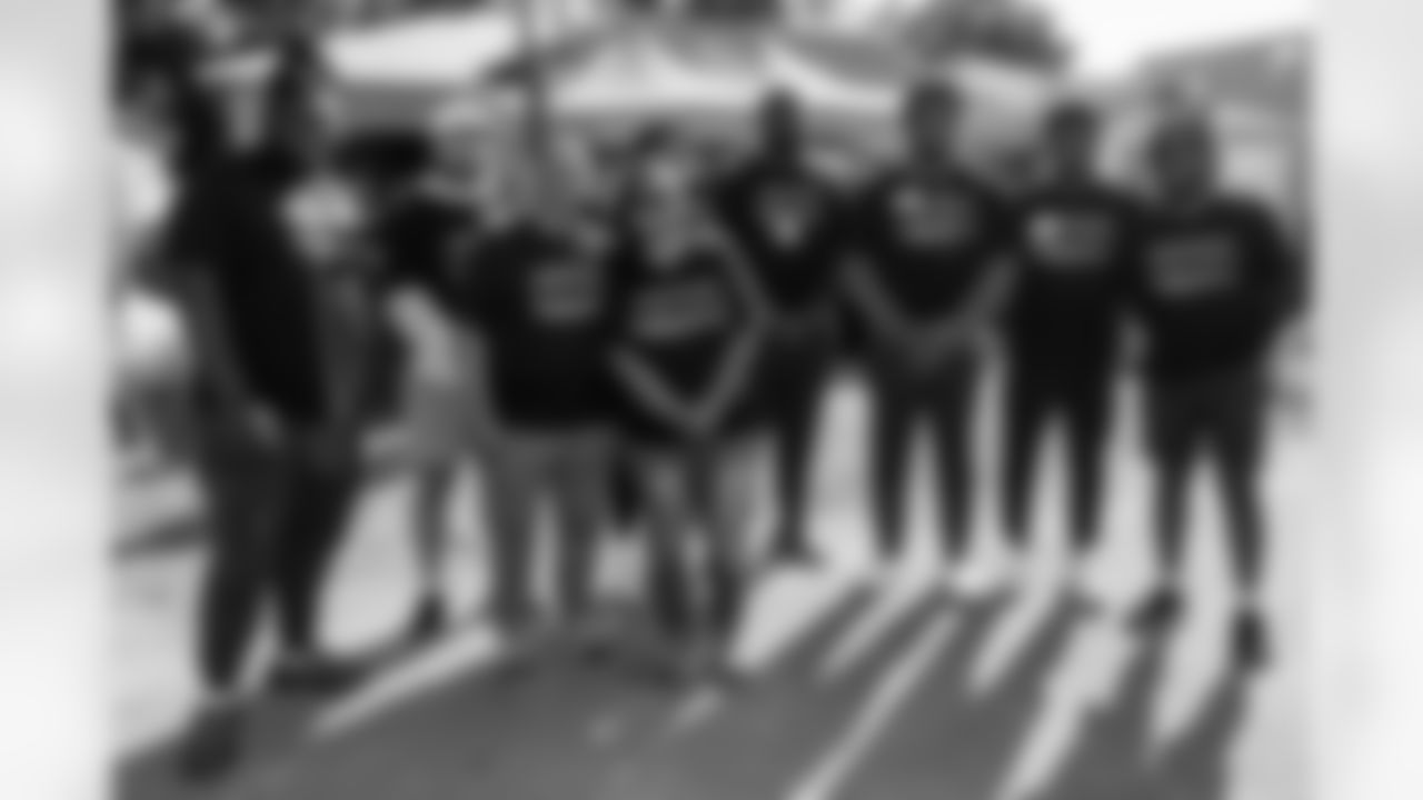 TAMPA, FL - November 18, 2025 - Defensive Lineman Elijah Simmons #92, Linebacker John Bullock #57, Cornerback Jacob Parrish #25, Defensive Tackle Jayson Jones #93, Defensive Lineman Elijah Roberts #95, Cornerback Benjamin Morrison #21, and Tyler Thompson during a home build with Habitat for Humanity of Tampa Bay Hillsborough. Photo By Doug DeFelice/Tampa Bay Buccaneers