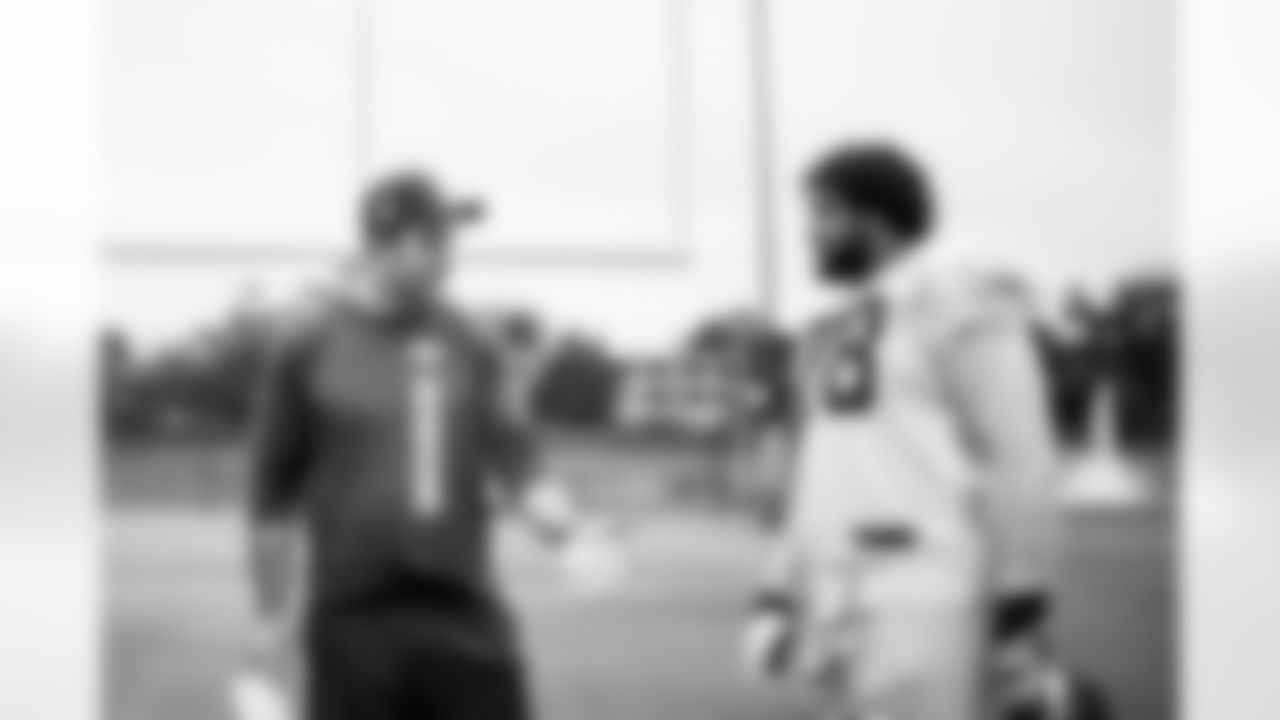 TAMPA, FL - November 06, 2025 - Run Game Coordinator/Offensive Line Coach Kevin Carberry and Tackle Tristan Wirfs #78 of the Tampa Bay Buccaneers during practice at AdventHealth Training Center. Photo By Tori Richman/Tampa Bay Buccaneers