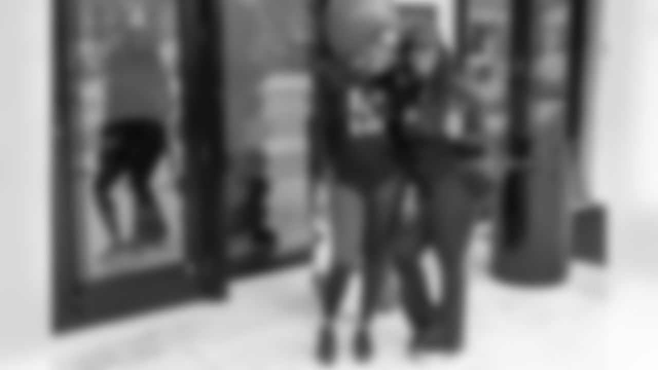 TAMPA, FL - December 06, 2025 - Participants arrive for the She is Football Bayshore Walk: Raise The Flags event with Bayshore Breakfast Club and Tampa Girls Social & Wellness at Hyde House Public Studio. Photo By Mike Carlson/Tampa Bay Buccaneers