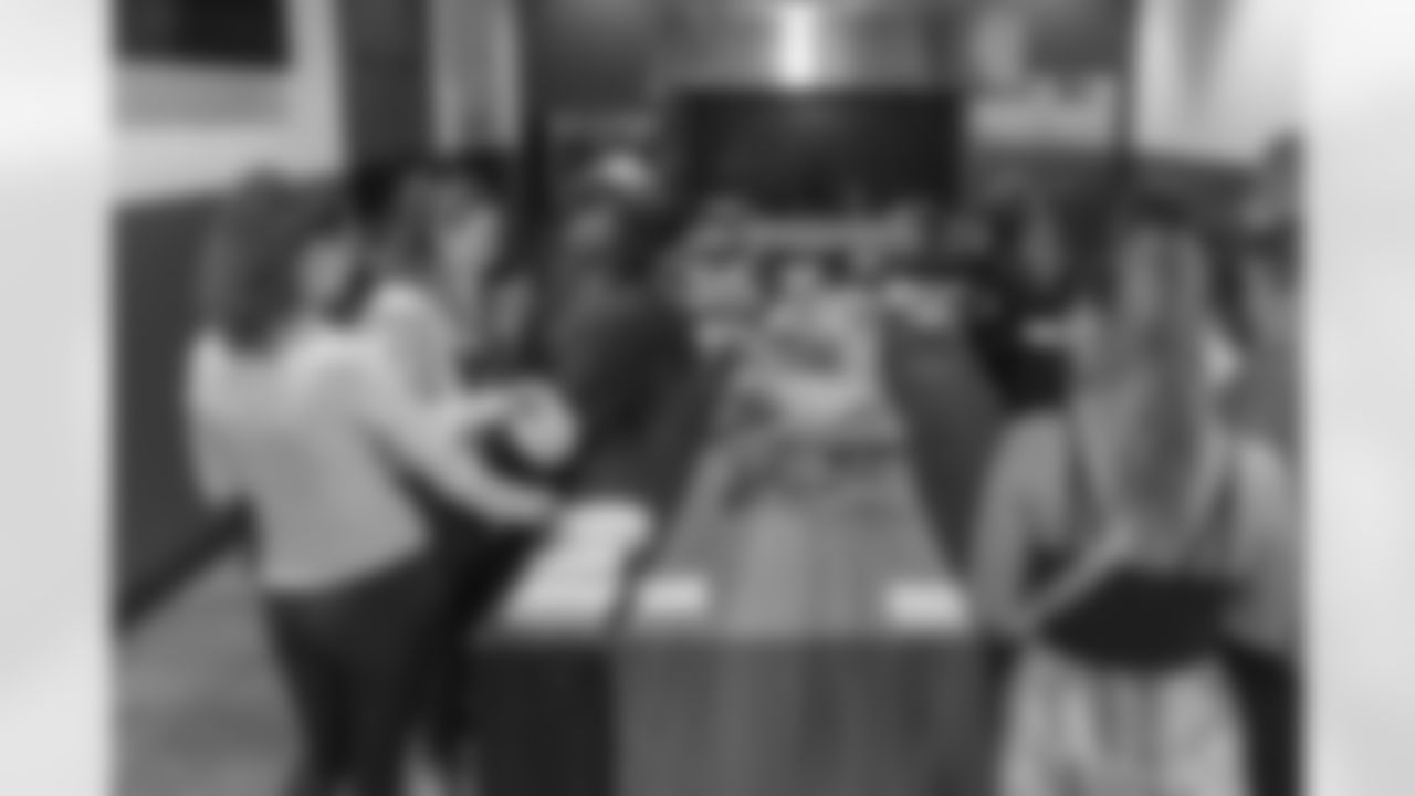 TAMPA, FL - December 06, 2025 - She is Football Bayshore Walk: Raise The Flags event with Bayshore Breakfast Club and Tampa Girls Social & Wellness at Hyde House Public Studio. Photo By Mike Carlson/Tampa Bay Buccaneers