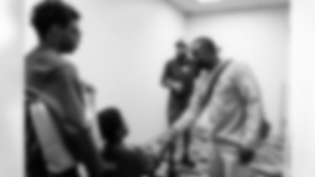 TAMPA, FL - December 05, 2025 - Mike and Ashli Evans host the Mike Evans Family Foundation 'Catch for Christmas' holiday event at AdventHealth Training Center. Photo By Kyle Zedaker/Tampa Bay Buccaneers