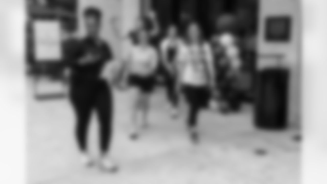 TAMPA, FL - December 06, 2025 - She is Football Bayshore Walk: Raise The Flags event with Bayshore Breakfast Club and Tampa Girls Social & Wellness at Hyde House Public Studio. Photo By Mike Carlson/Tampa Bay Buccaneers