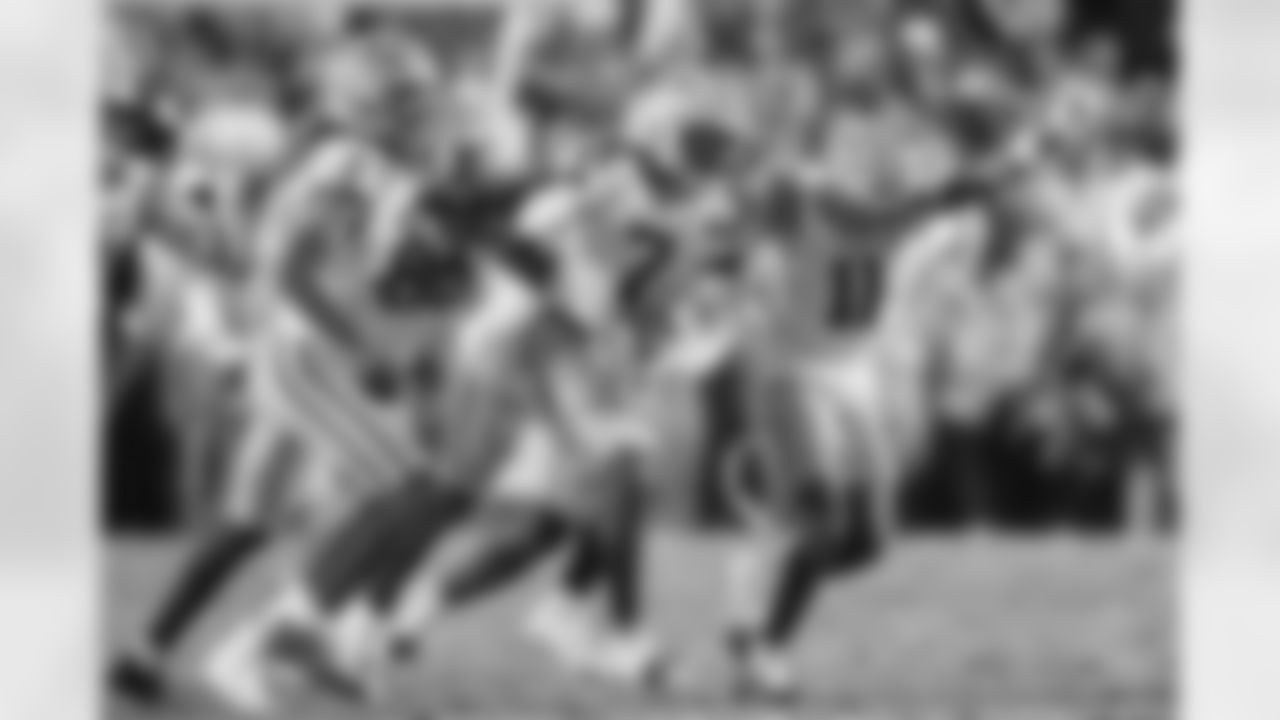 LSU linebacker Harold Perkins Jr. (7) celebrates his interception with cornerback PJ Woodland (11) and cornerback DJ Pickett (3) in the first half of an NCAA college football game against Texas A&M, Saturday, Oct. 25, 2025 in Baton Rouge, La. (AP Photo/Gerald Herbert)