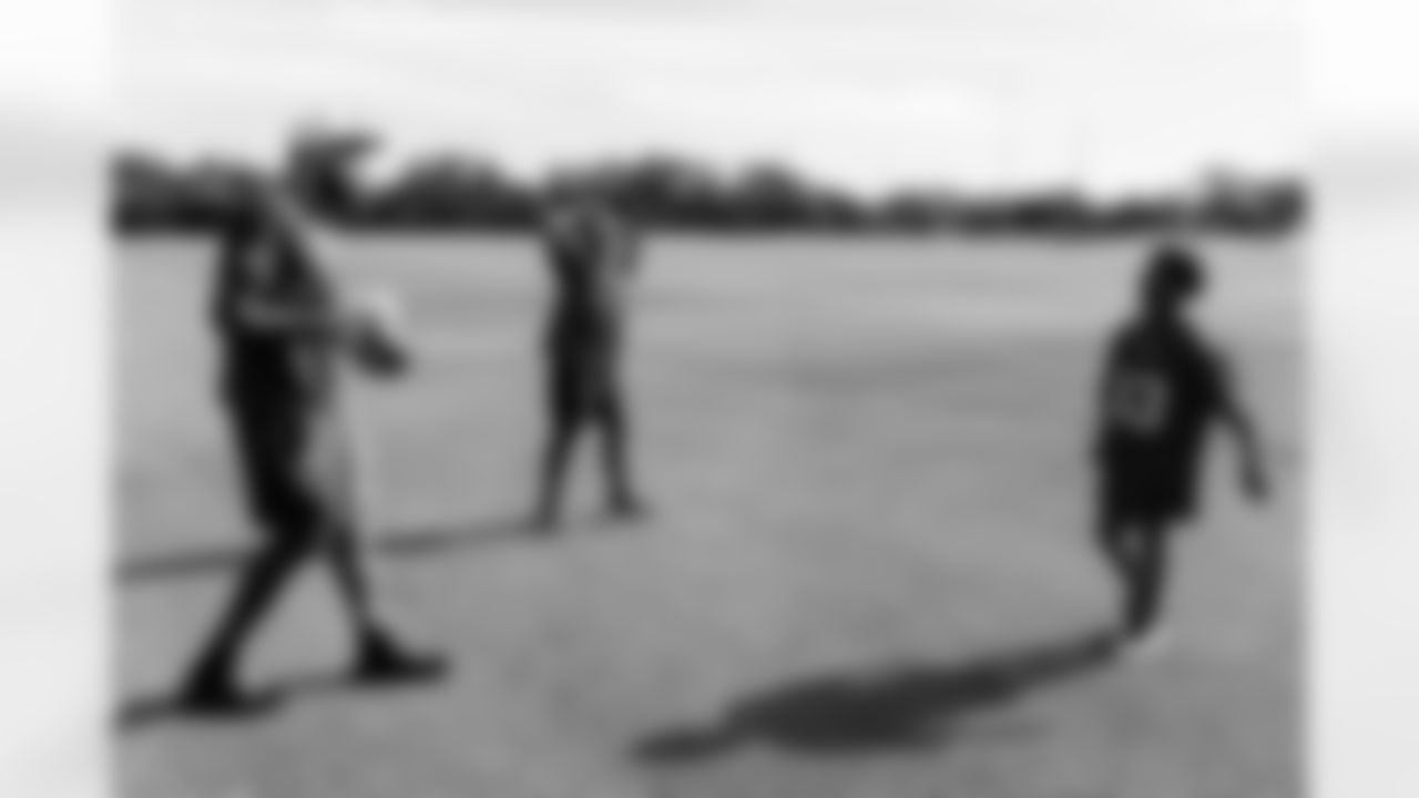 TAMPA, FL - December 05, 2025 - Mike and Ashli Evans host the Mike Evans Family Foundation 'Catch for Christmas' holiday event at AdventHealth Training Center. Photo By Kyle Zedaker/Tampa Bay Buccaneers