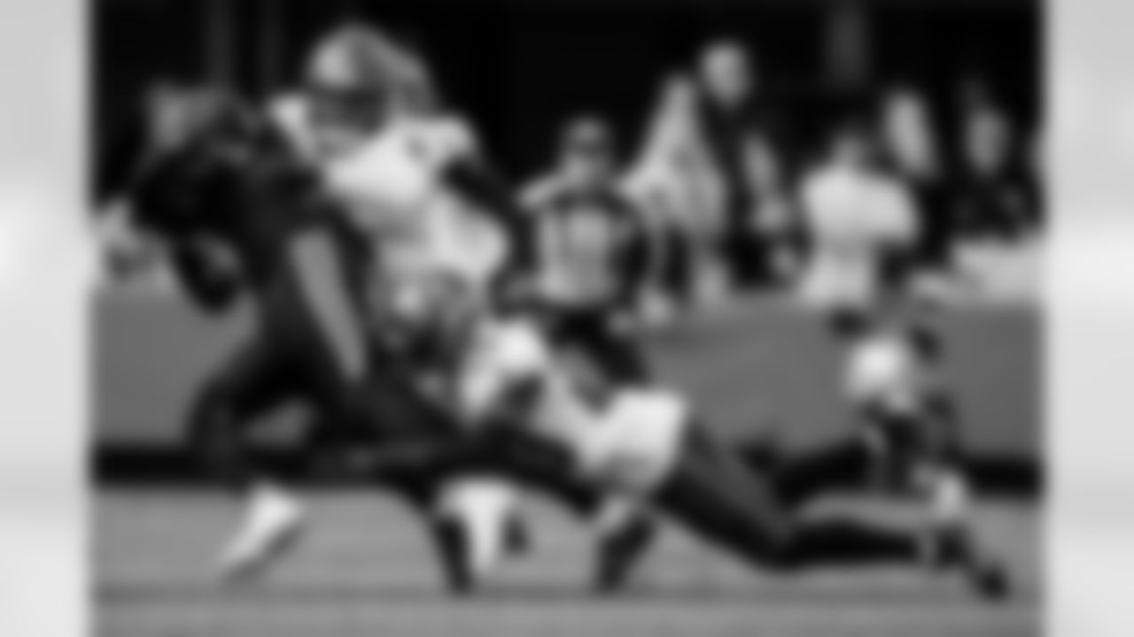 CHARLOTTE, NC - December 21, 2025 - Inside Linebacker SirVocea Dennis #8 and Safety Tykee Smith #23 of the Tampa Bay Buccaneers during the game between the Tampa Bay Buccaneers and Carolina Panthers. The Bucs lost the game, 23-20. Photo By Kyle Zedaker/Tampa Bay Buccaneers