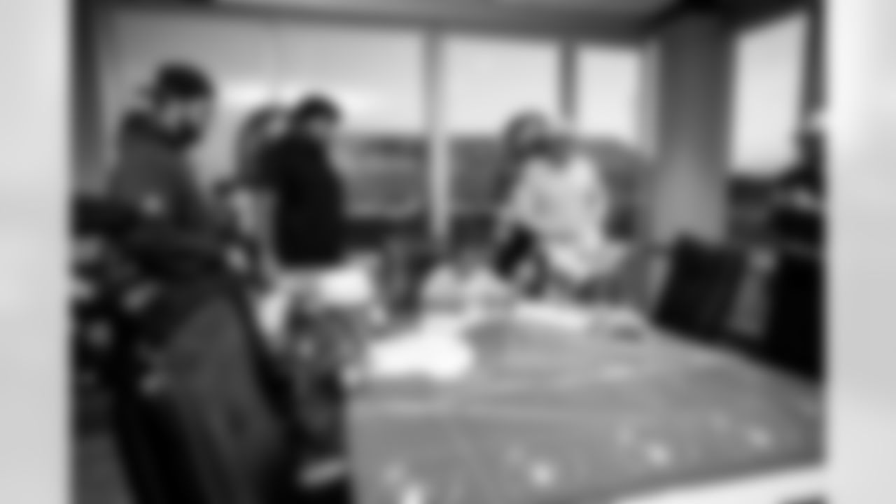 TAMPA, FL - November 19, 2025 - Guard Ben Bredeson #68, Tackle Tristan Wirfs #78, and Quarterback Baker Mayfield #6 of the Tampa Bay Buccaneers during a visit with Triumph Together Cancer Warriors. Photo By Kyle Zedaker/Tampa Bay Buccaneers