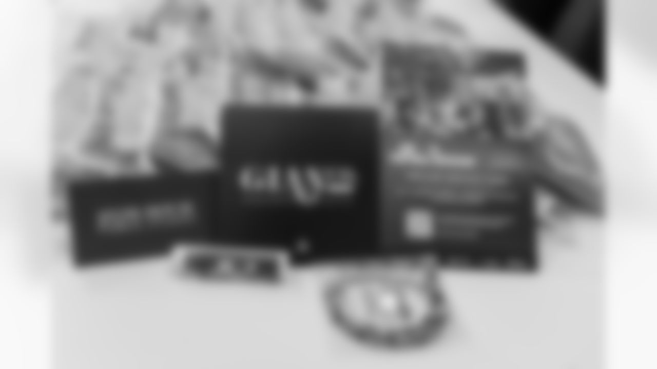 TAMPA, FL - December 06, 2025 - Set up for the She is Football Bayshore Walk: Raise The Flags event with Bayshore Breakfast Club and Tampa Girls Social & Wellness at Hyde House Public Studio. Photo By Mike Carlson/Tampa Bay Buccaneers