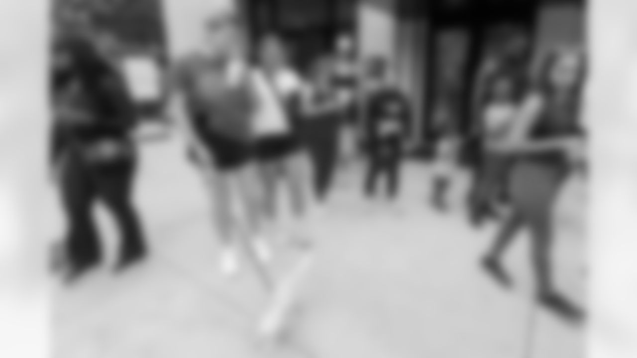 TAMPA, FL - December 06, 2025 - She is Football Bayshore Walk: Raise The Flags event with Bayshore Breakfast Club and Tampa Girls Social & Wellness at Hyde House Public Studio. Photo By Mike Carlson/Tampa Bay Buccaneers