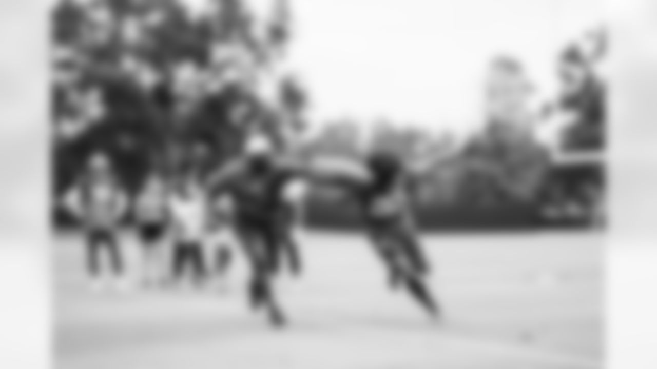 TAMPA, FL - November 06, 2025 - Defensive/Special Teams Assistant Keith Tandy and Cornerback Kindle Vildor #22 of the Tampa Bay Buccaneers during practice at AdventHealth Training Center. Photo By Tori Richman/Tampa Bay Buccaneers