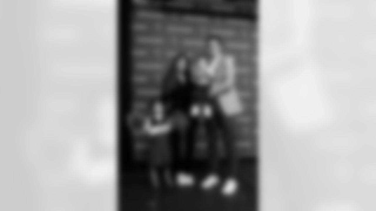 TAMPA, FL - January 27, 2026 - Offensive Coordinator Zac Robinson of the Tampa Bay Buccaneers and his family during his introductory press conference at AdventHealth Training Center. Photo By Tori Richman/Tampa Bay Buccaneers