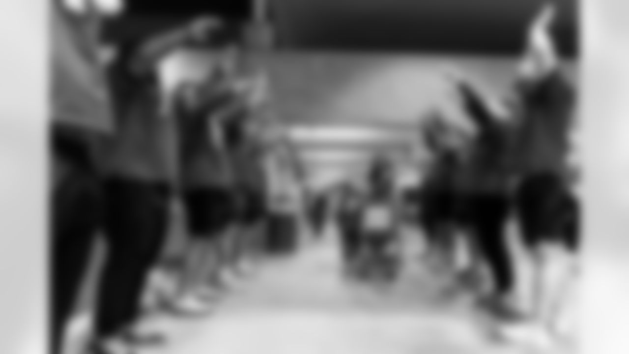 TAMPA, FL - December 15, 2025 - The Tampa Bay Buccaneers offensive line hosts the annual 'O-Line Lights Up Christmas' event providing holiday shopping sprees for local children. Photo By Kyle Zedaker/Tampa Bay Buccaneers