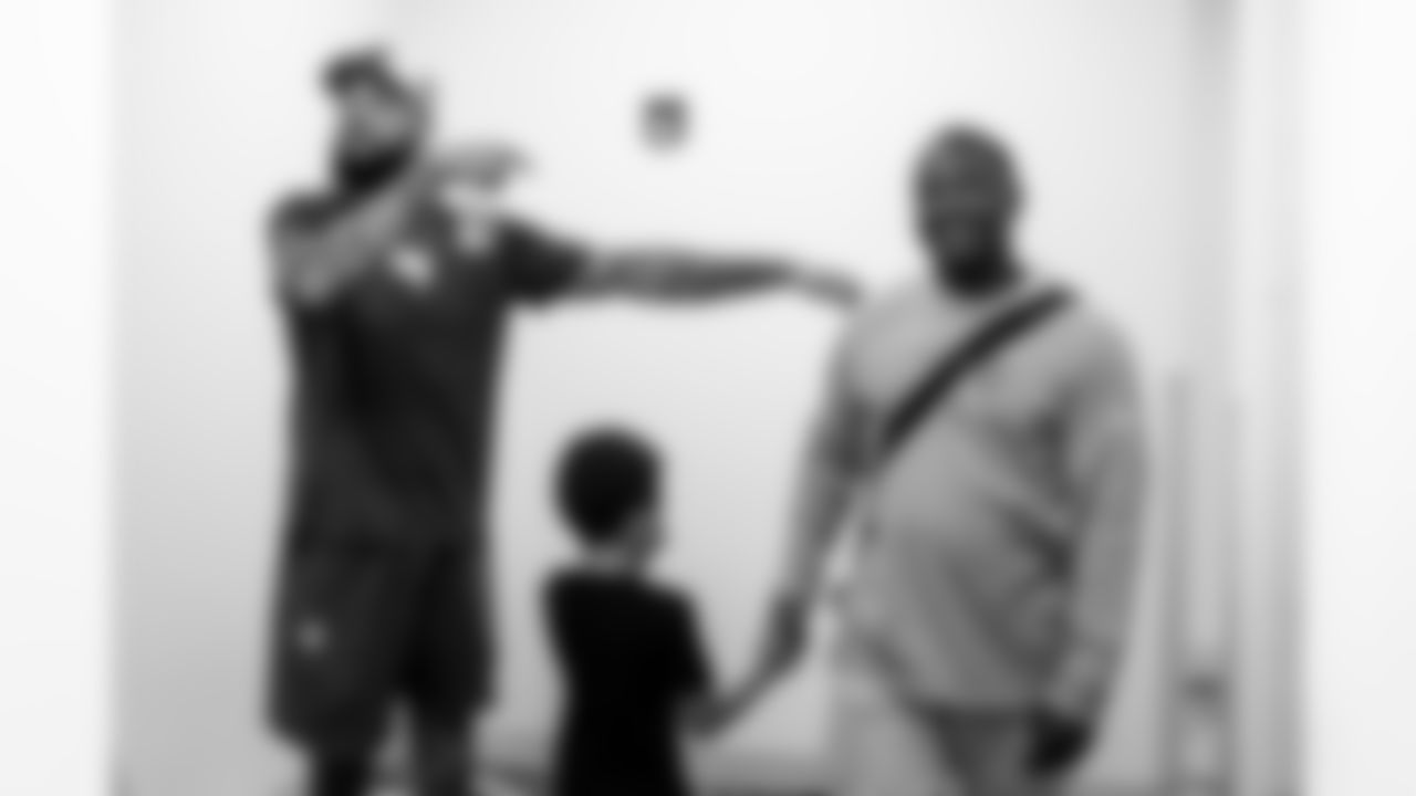 TAMPA, FL - December 05, 2025 - Mike and Ashli Evans host the Mike Evans Family Foundation 'Catch for Christmas' holiday event at AdventHealth Training Center. Photo By Kyle Zedaker/Tampa Bay Buccaneers