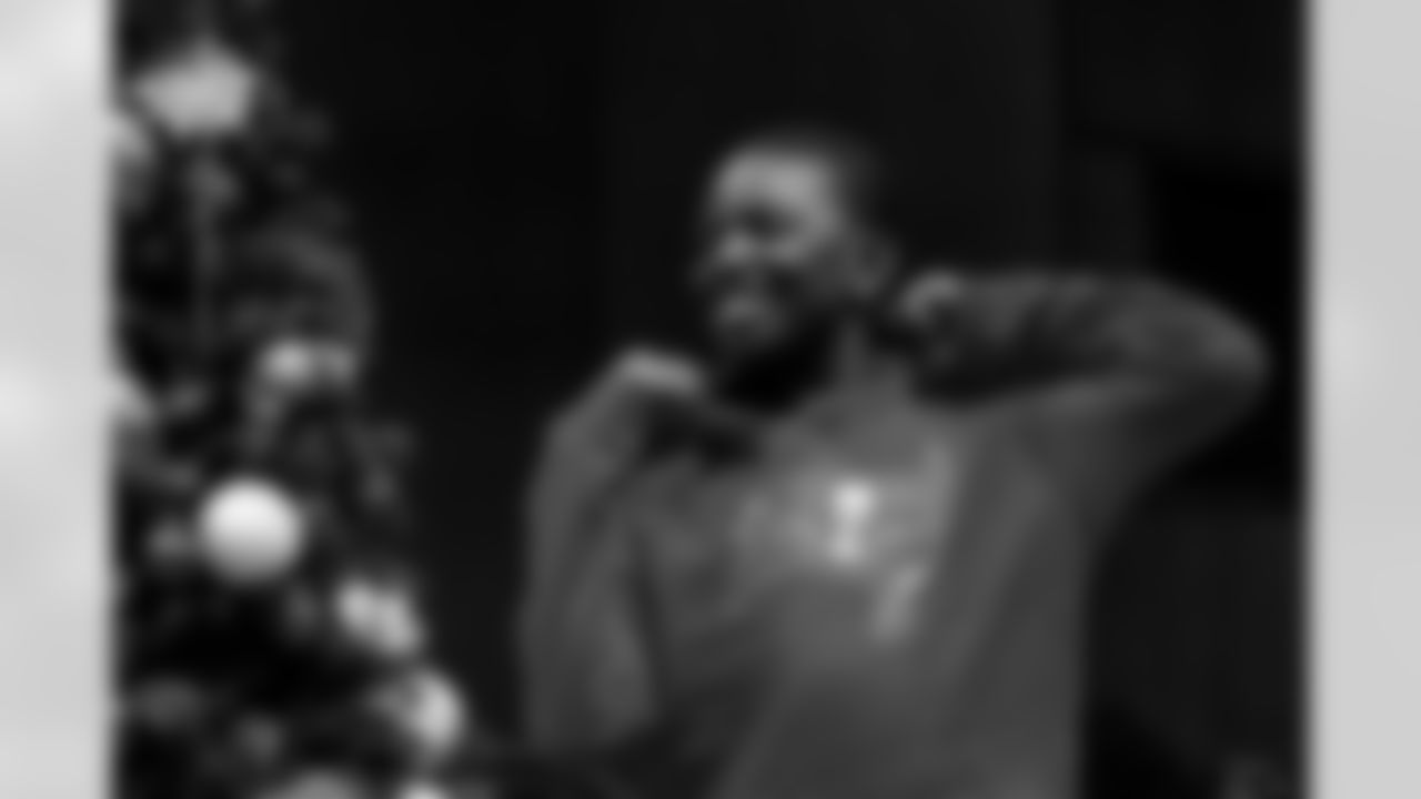 TAMPA, FL - December 05, 2025 - Mike and Ashli Evans host the Mike Evans Family Foundation 'Catch for Christmas' holiday event at AdventHealth Training Center. Photo By Kyle Zedaker/Tampa Bay Buccaneers