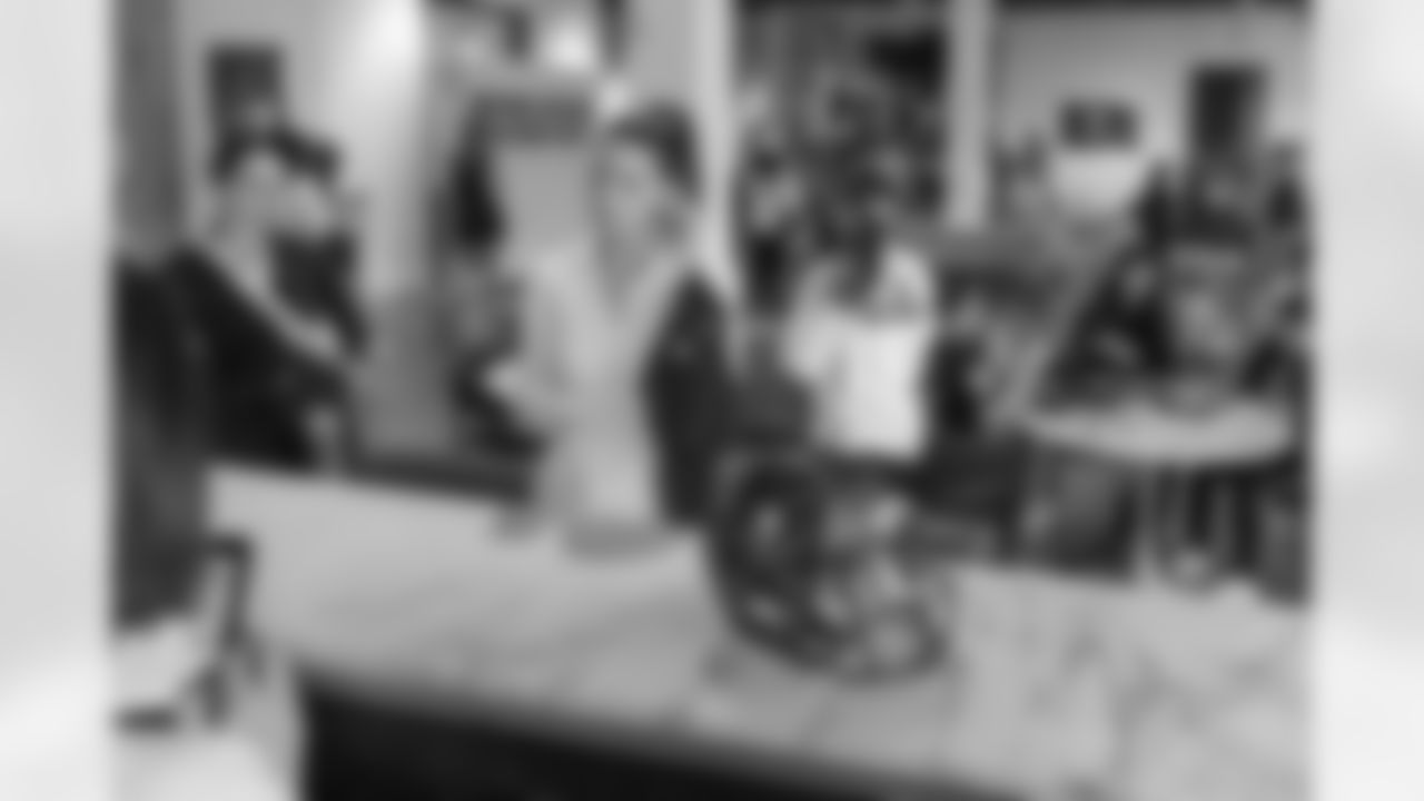 TAMPA, FL - December 06, 2025 - She is Football Bayshore Walk: Raise The Flags event with Bayshore Breakfast Club and Tampa Girls Social & Wellness at Hyde House Public Studio. Photo By Mike Carlson/Tampa Bay Buccaneers