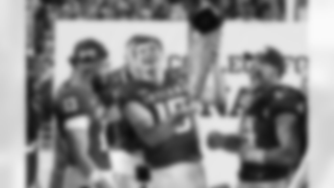 Indiana quarterback Fernando Mendoza (15) holds the trophy after Indiana defeated Miami in a College Football Playoff national championship game, Monday, Jan. 19, 2026, in Miami Gardens, Fla. (AP Photo/Lynne Sladky)