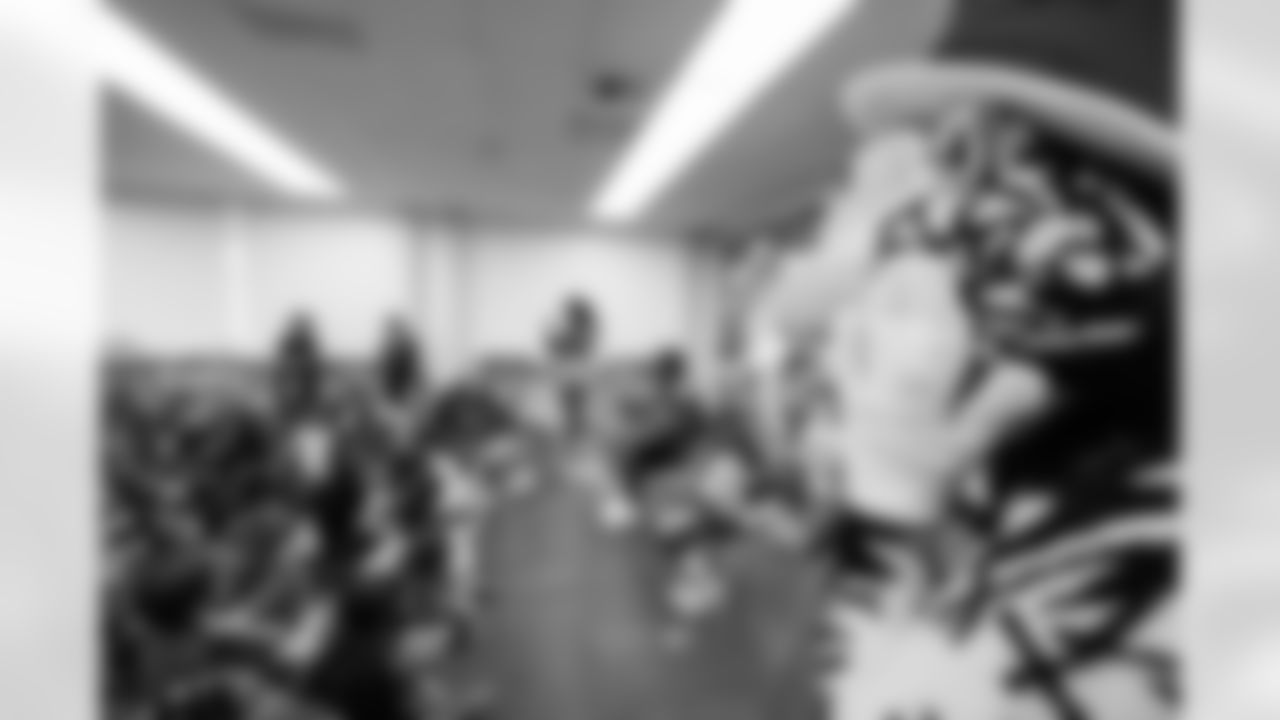 TAMPA, FL - March 03, 2026 - Safety Rashad Wisdom #38 of the Tampa Bay Buccaneers and Tampa Bay Buccaneers Cheerleaders during the National Reading Month celebration hosted by The Tampa Bay Buccaneers and Dr. Seuss Enterprises at Potter Elementary School. Photo By Doug DeFelice/Tampa Bay Buccaneers