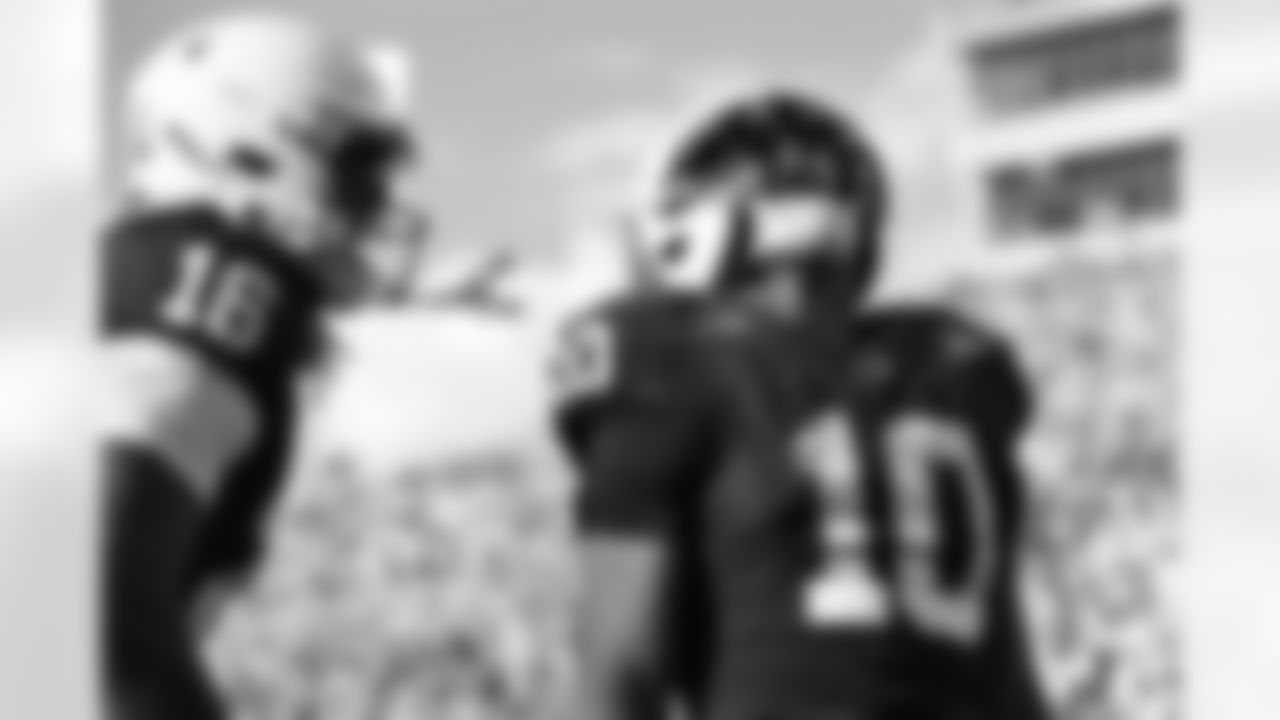 Penn State running back Nicholas Singleton (10) celebrates a touchdown with tight end Khalil Dinkins (16) during the fourth quarter of an NCAA college football game against Indiana, Saturday, Nov. 8, 2025, in State College, Pa. (AP Photo/Barry Reeger)