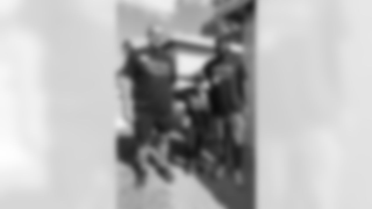 TAMPA, FL - November 18, 2025 - Offensive Lineman Lorenz Metz #71 and Tight End Devin Culp #82 of the Tampa Bay Buccaneers during a home build with Habitat for Humanity of Tampa Bay Hillsborough. Photo By Doug DeFelice/Tampa Bay Buccaneers