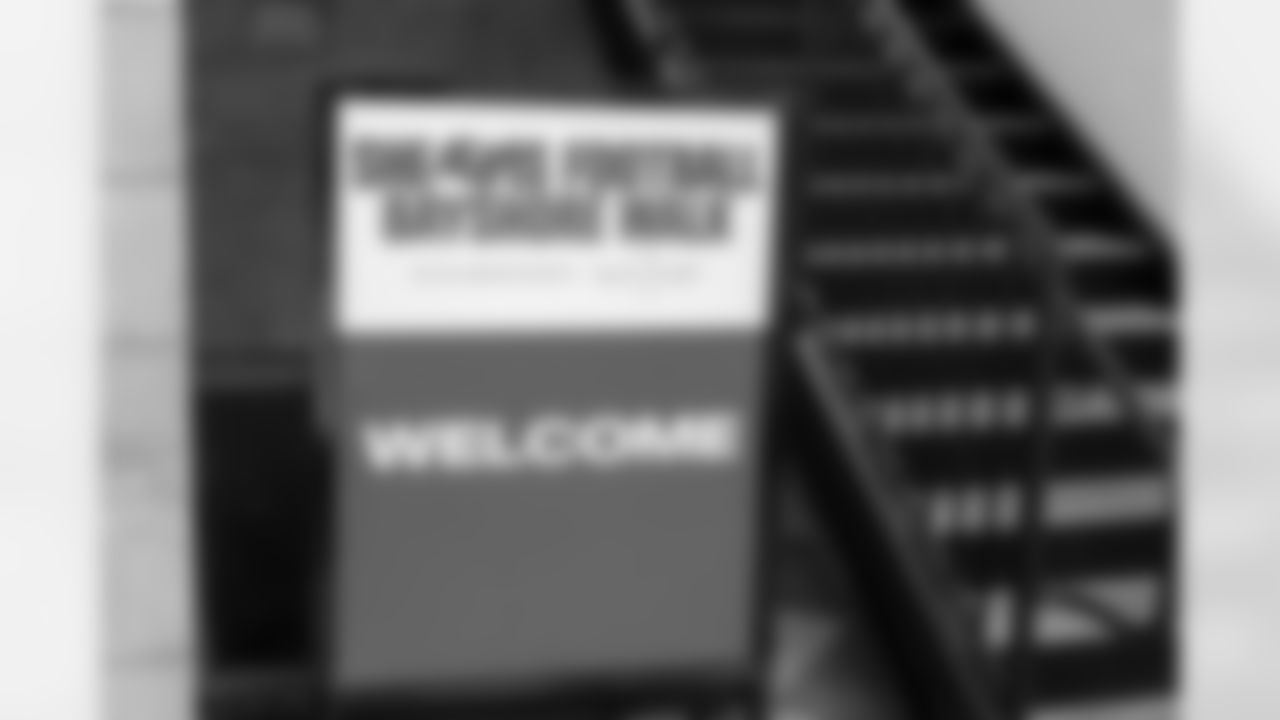 TAMPA, FL - December 06, 2025 - Set up for the She is Football Bayshore Walk: Raise The Flags event with Bayshore Breakfast Club and Tampa Girls Social & Wellness at Hyde House Public Studio. Photo By Mike Carlson/Tampa Bay Buccaneers