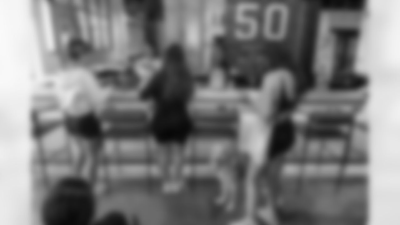 TAMPA, FL - December 06, 2025 - She is Football Bayshore Walk: Raise The Flags event with Bayshore Breakfast Club and Tampa Girls Social & Wellness at Hyde House Public Studio. Photo By Mike Carlson/Tampa Bay Buccaneers